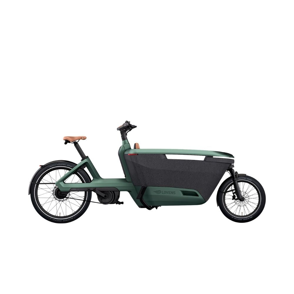 A green and black electric cargo bike with a brown saddle, shown from a side profile on a solid white background.